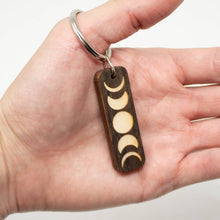 Load image into Gallery viewer, Moon Phases Cut Wooden Keychain
