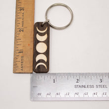 Load image into Gallery viewer, Moon Phases Cut Wooden Keychain
